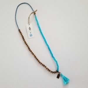 Fossil me to we Bead bracelet/necklace with tassel